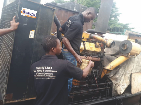 Westac technicians working on a generator